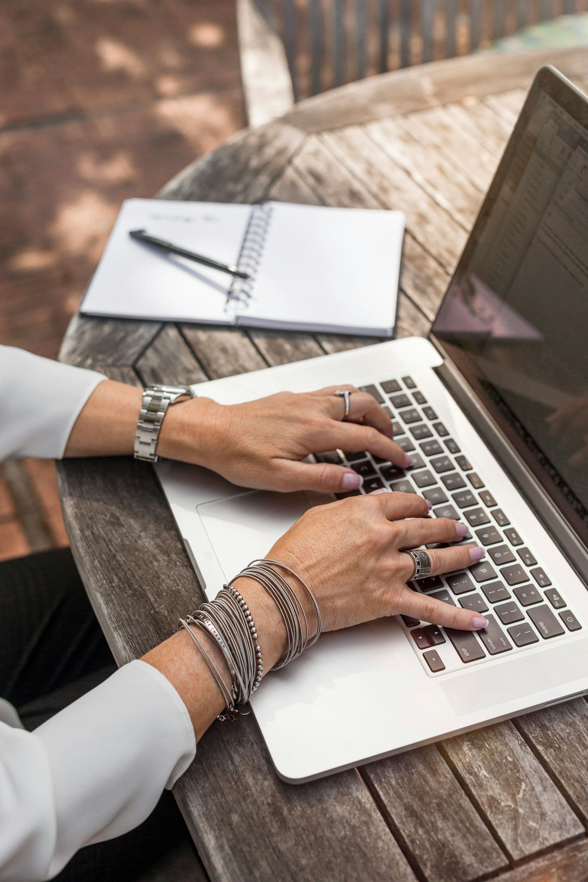 New small business owner setting up bookkeeping on a laptop