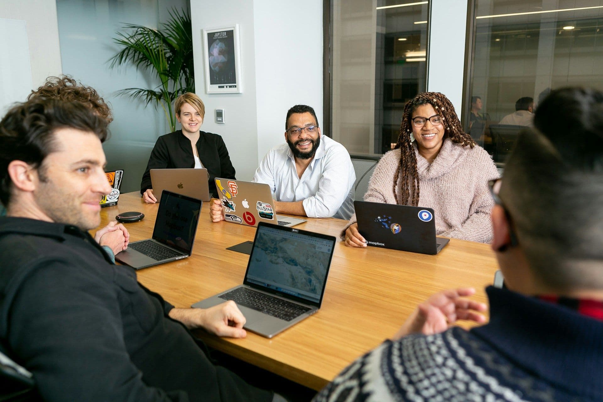 A team meeting around a table in an office