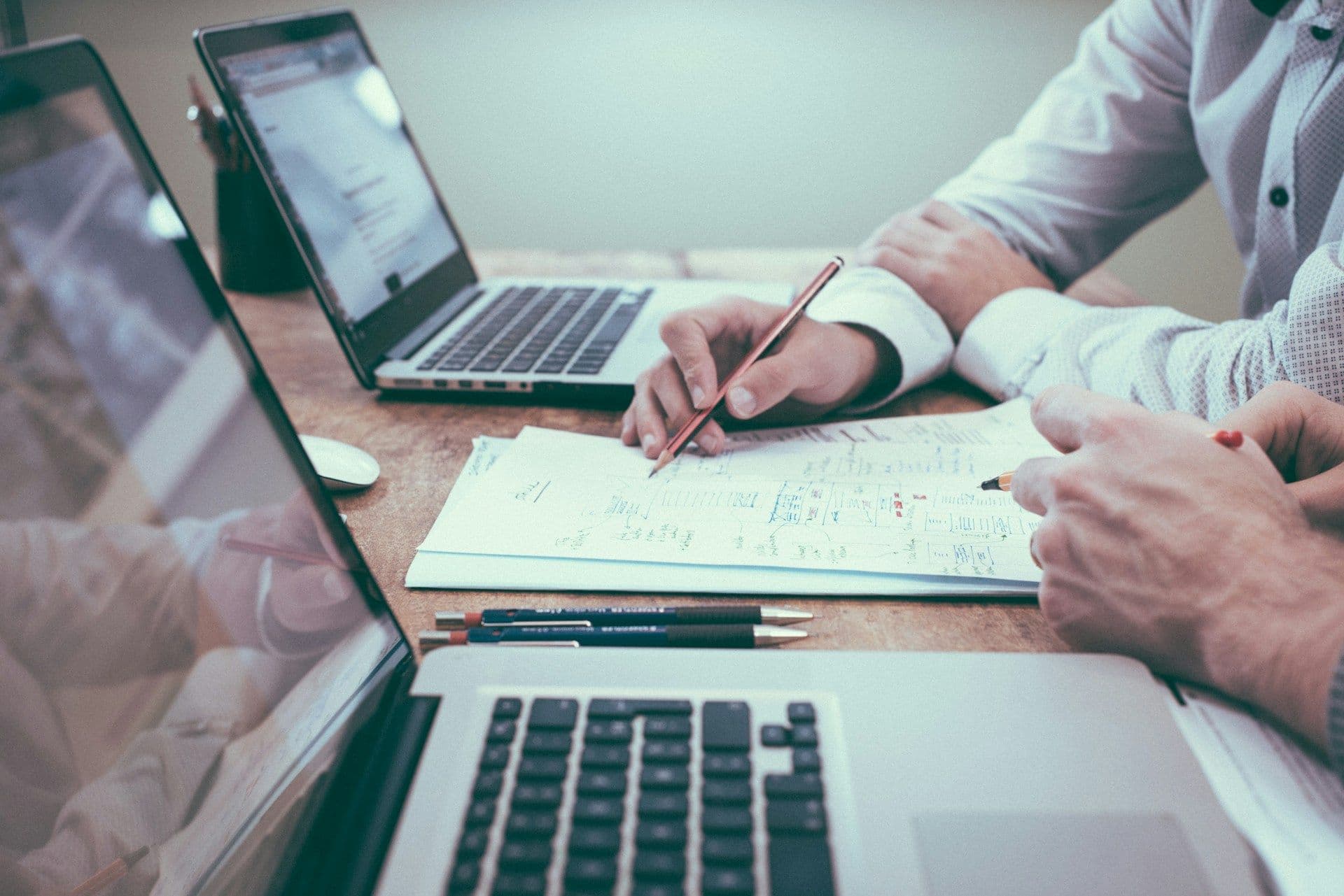CPA firm professionals reviewing financial data on screens